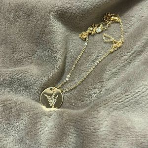 NWOT December Birthday Flower Gold Necklace